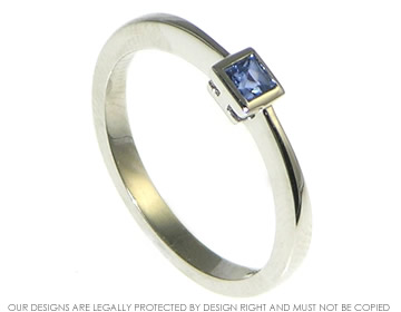 Olivia wanted to reuse her own sapphire in her engagment ring 