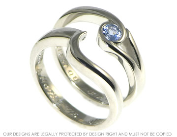 Palladium and sapphire engagement and wedding ring set. 