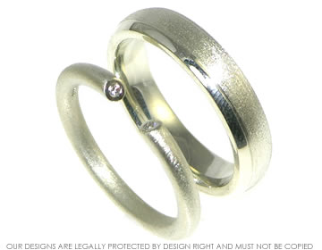 9ct white gold wedding band with invisibly set diamonds. 