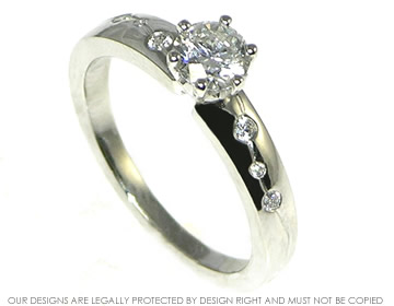 Platinum and brilliant cut 0.51ct diamond engagement ring 