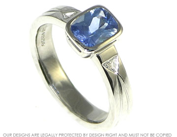 Sapphire and diamond platinum engagement ring 