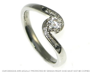 Bespoke 18ct white gold and palladium engagement ring with black and white diamonds