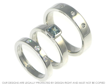 Palladium mans wedding ring with circular holes pattern