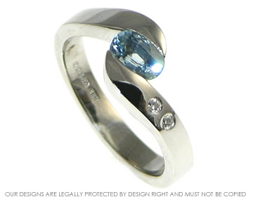 A blue sapphire twist style engagement ring for Hannah