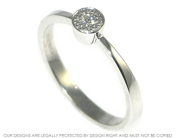 Bespoke 9ct white gold engagment ring with a 2.5mm rnd 0.06ct diamond.