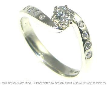 Twist style engagement ring with customers own diamonds