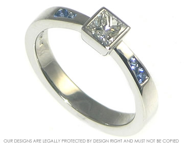 Bespoke Palladium Engagement ring with Diamond and Sapphires.