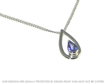 Stephen and Sarah's palladium tanzanite pendant