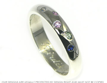 Susan wanted a  9ct white gold dress ring with coloured stones