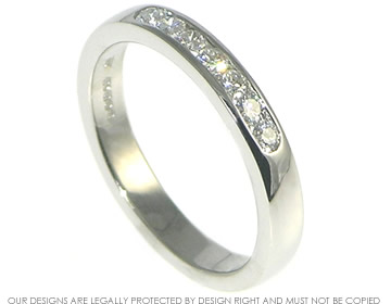 Palladium and diamond eternity ring, a classic half eternity ring shape