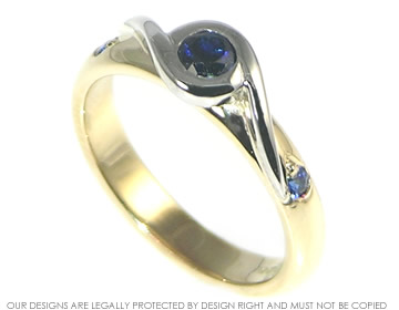 Susan's 9ct yellow and white gold engagment ring with blue Sapphire