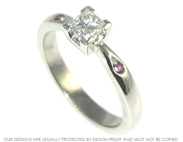 Julie's platinum and princess cut dimaond with grain set rubies.