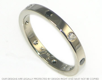 Julie's 18ct white gold Eternity ring with black and white diamonds. 