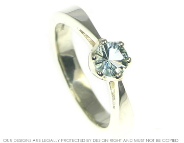 Laser cut aquamarine and 9ct white gold engagement ring