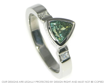 Elizabeth wanted a trilliant cut green sapphire in her engagement ring