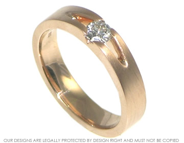 Andy wished to design a rose gold diamond engagement ring