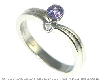 “Uniting paths” inspired lilac sapphire, diamond and platinum engagement ring