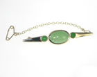samuel and mary designed this brooch to hold their jade stones