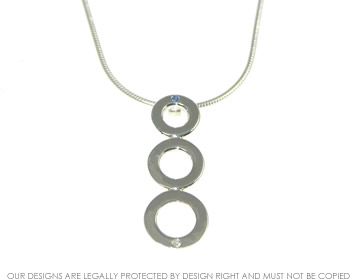 Kenneth wanted a three circle silver pendant for his fiancee