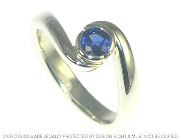 Gwen's 9ct white gold blue sapphire twist style engagement ring