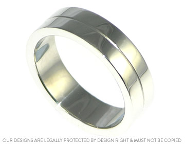 Paul wanted a simple platinum wedding ring