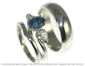 Anna's palladium engagement ring with sapphire and diamonds