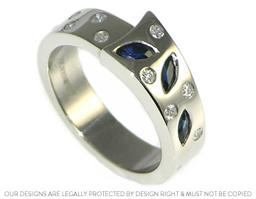 Lyn's palladium ring with her own rich blue sapphires and diamonds