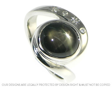 Dramatic black star sapphire 9ct white gold  rhodium plated engagement ring