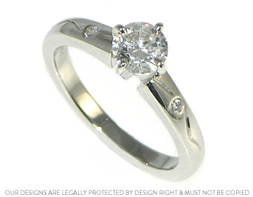 A classic diamond engagement ring with a slightly modern twist