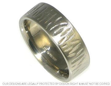 Chris wanted a wide wedding ring with engraved detail