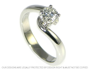 Cheryl's one of a kind diamond and platinum twist engagement ring 