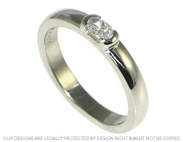 Samuel and Briony's diamond tension style engagement ring