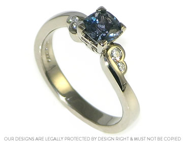 Oriental inspired smokey violet sapphire and 18ct white gold engagement ring 