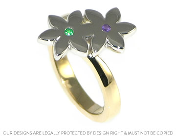 Flower inspired dress ring with amethyst and emerald stones