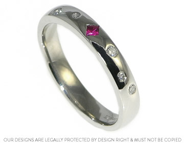 Sarah's bespoke scatter set eternity ring with diamonds and a ruby