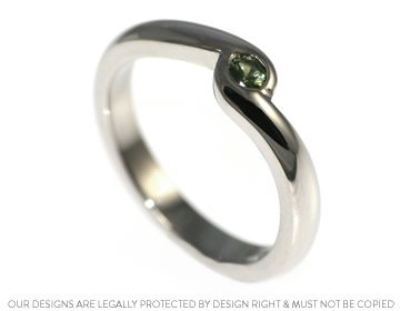 Zoe's palladium and green sapphire twist style engagement ring