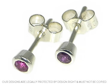 Nicola's stud earrings using her own rubies