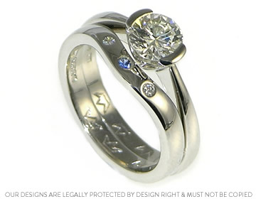 Platinum waved wedding ring to compliment Erika's engagement ring