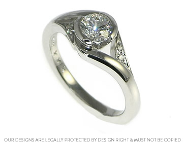 Emma's platinum engagement ring with a stunning 0.52ct diamond