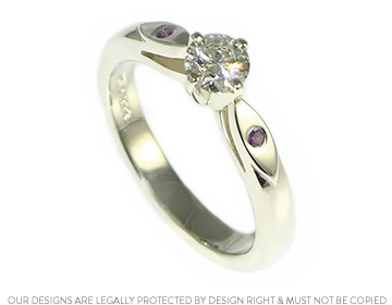 Caroline's solitaire engagement ring with twinkly lilac sapphires