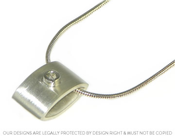 Bespoke silver pendant using Linda's diamond