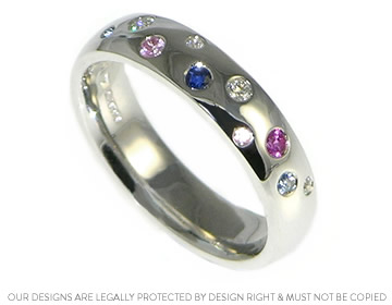 Stunning scattered style eternity ring with sapphires and diamonds