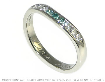 Denise's platinum and heat treated diamond fitted eternity ring. 