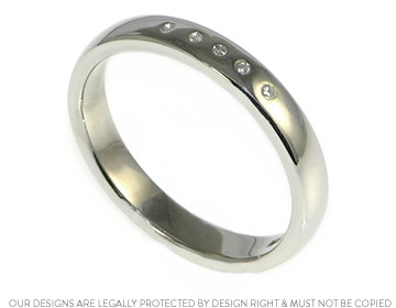 Laura wanted to use her own diamonds in her bespoke wedding ring