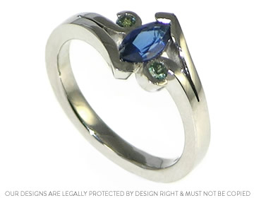 Andrew and Sam's marquise shaped sapphire engagement ring