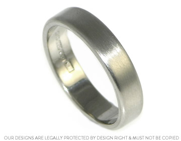 Frazer's sleek wedding ring crafted in palladium