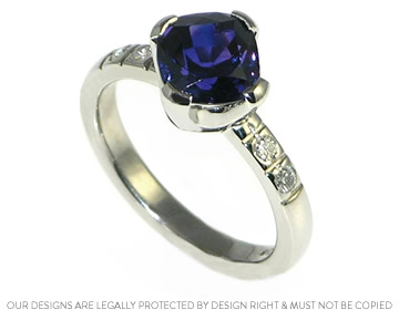 Palladium engagement ring with a stunning cushion cut purple sapphire