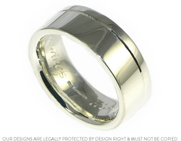 Keith and Lynsey's 9ct white gold wedding ring with engraved detail