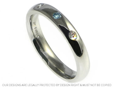 Eternity ring with an aquamarine to symbolise Stewart and Claire's child