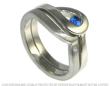 Carolan's palladium wave inspired wedding ring